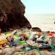 a picture of rubbish washed up on a beach